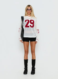 side view of model wearing Princess Polly Korrin V Neck Graphic Knit Sweater White 