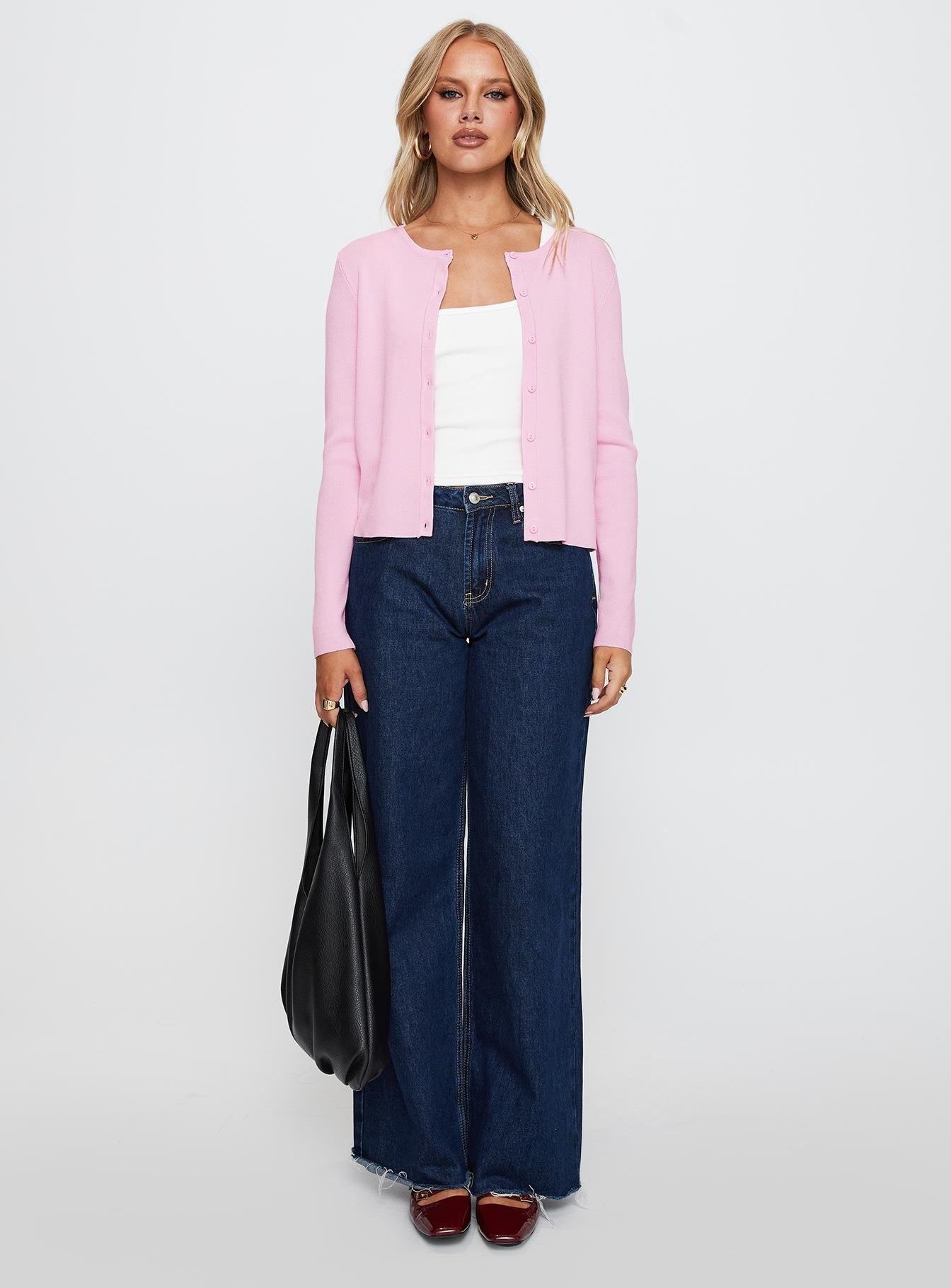 front view of model wearing Princess Polly Old Burlington Knit Cardigan Pink Cropped 