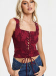 red Corset top Textured floral print, tie fastening at front, fixed straps