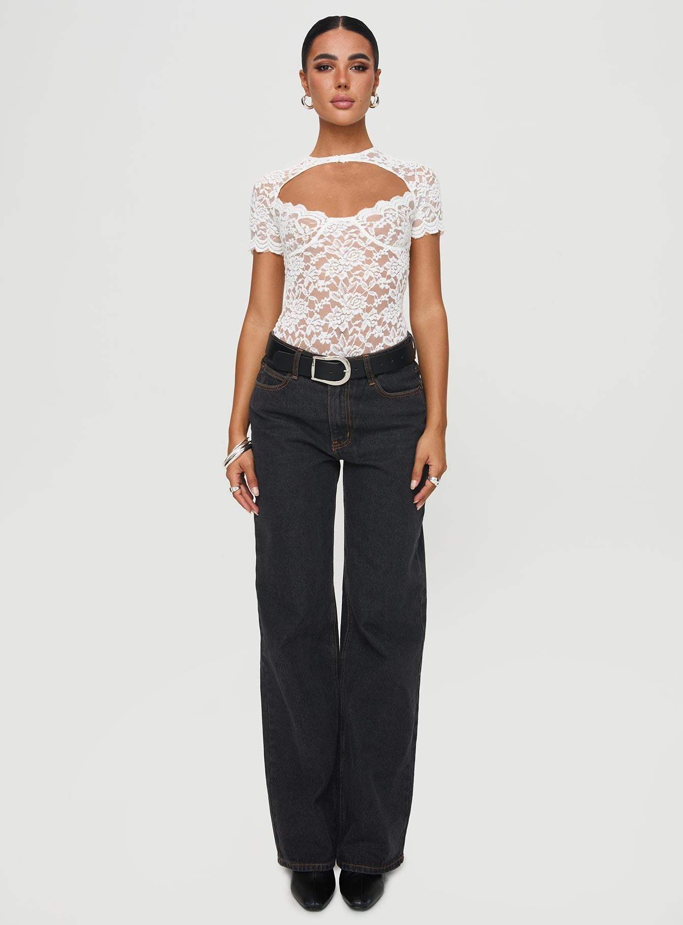 side view of model wearing Princess Polly Giallo Bodysuit White Short Sleeve 