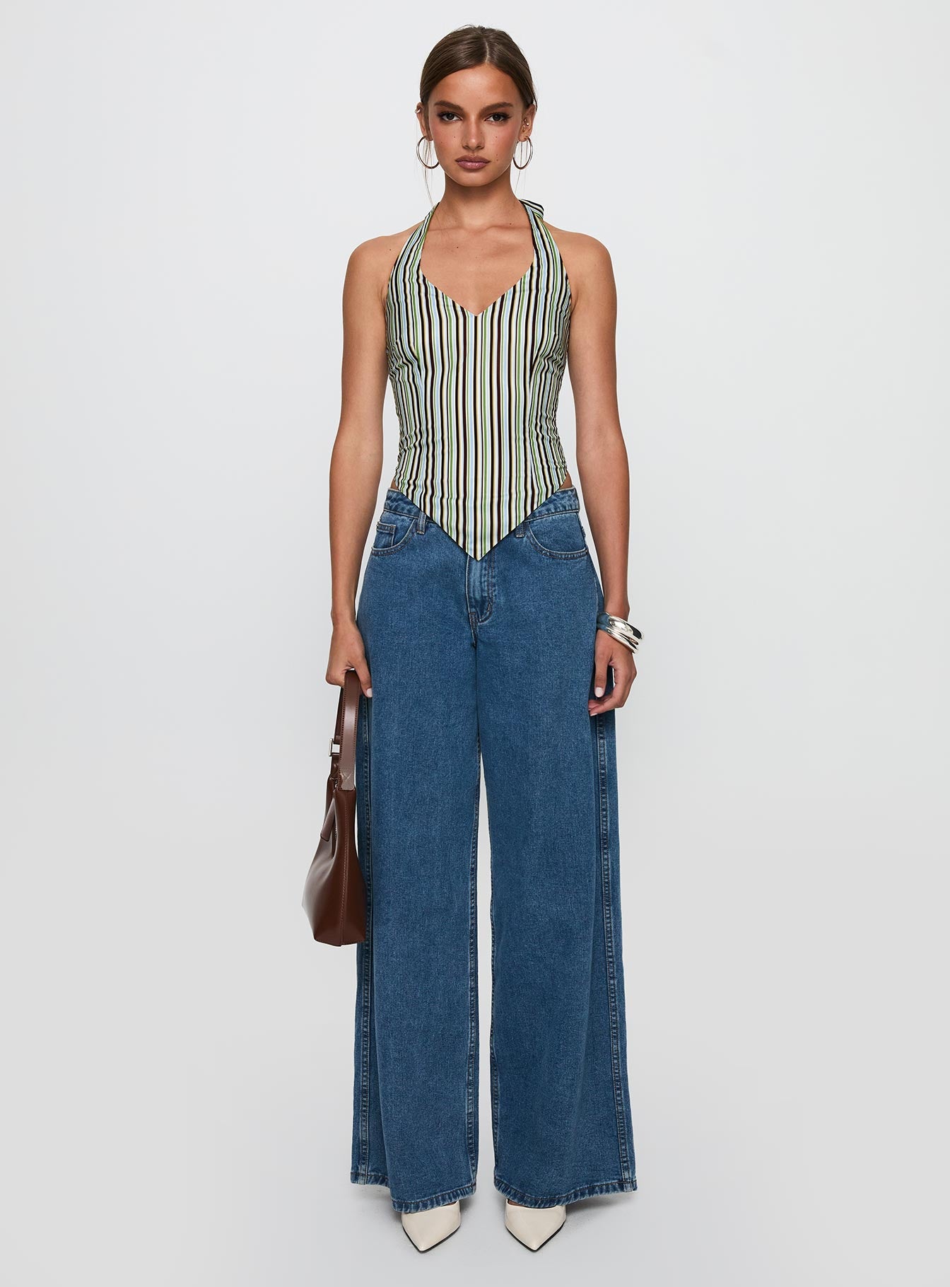 side view of model wearing Princess Polly High Gear Halter Top Multi Sleeveless V-Neck 