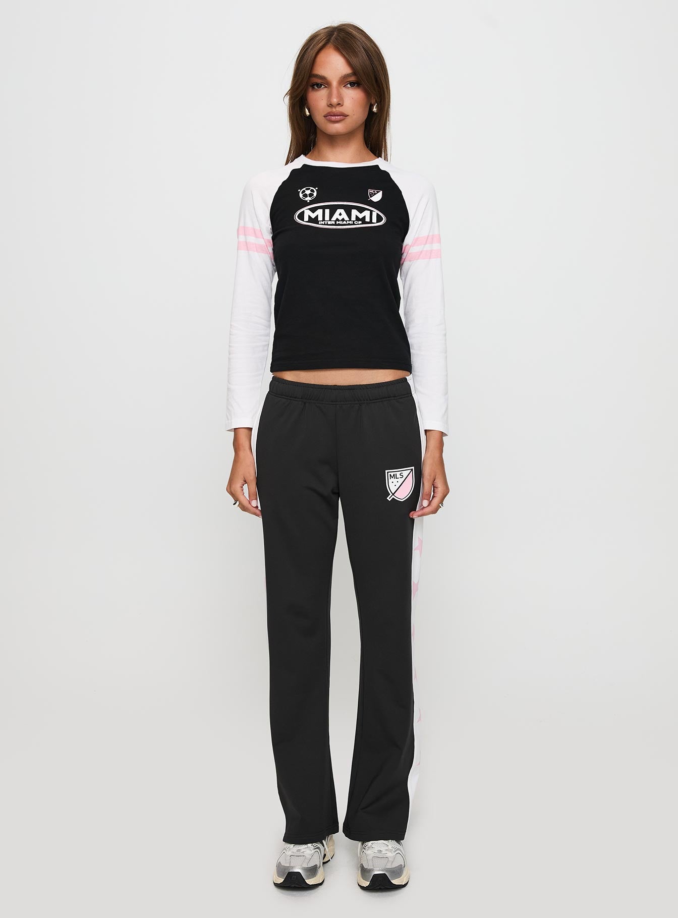 front view of model wearing Princess Polly Track Star Pants Black Low Rise Pants 