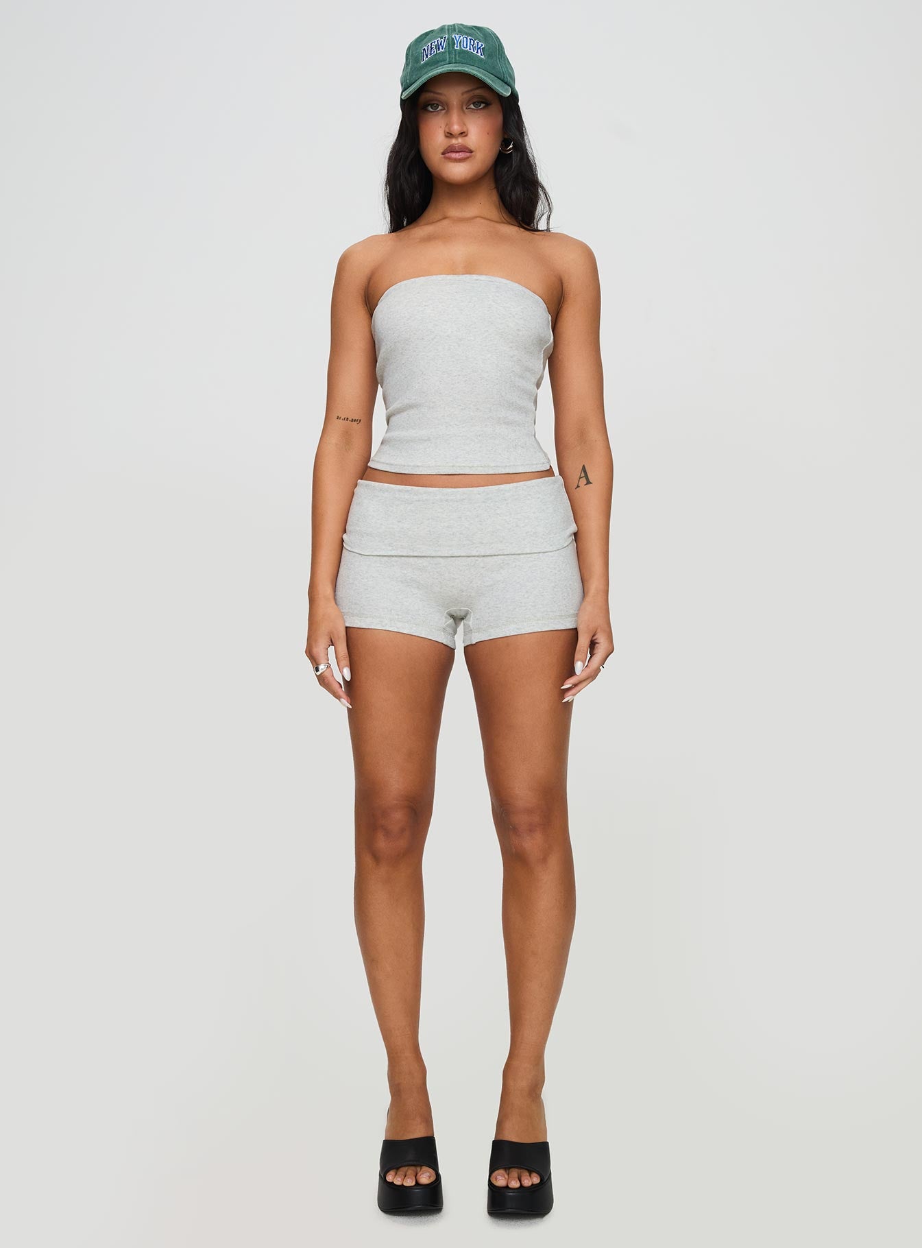 front view of model wearing Princess Polly Baseline Low Rise Rib Shorts Grey Marle Low Rise Shorts 