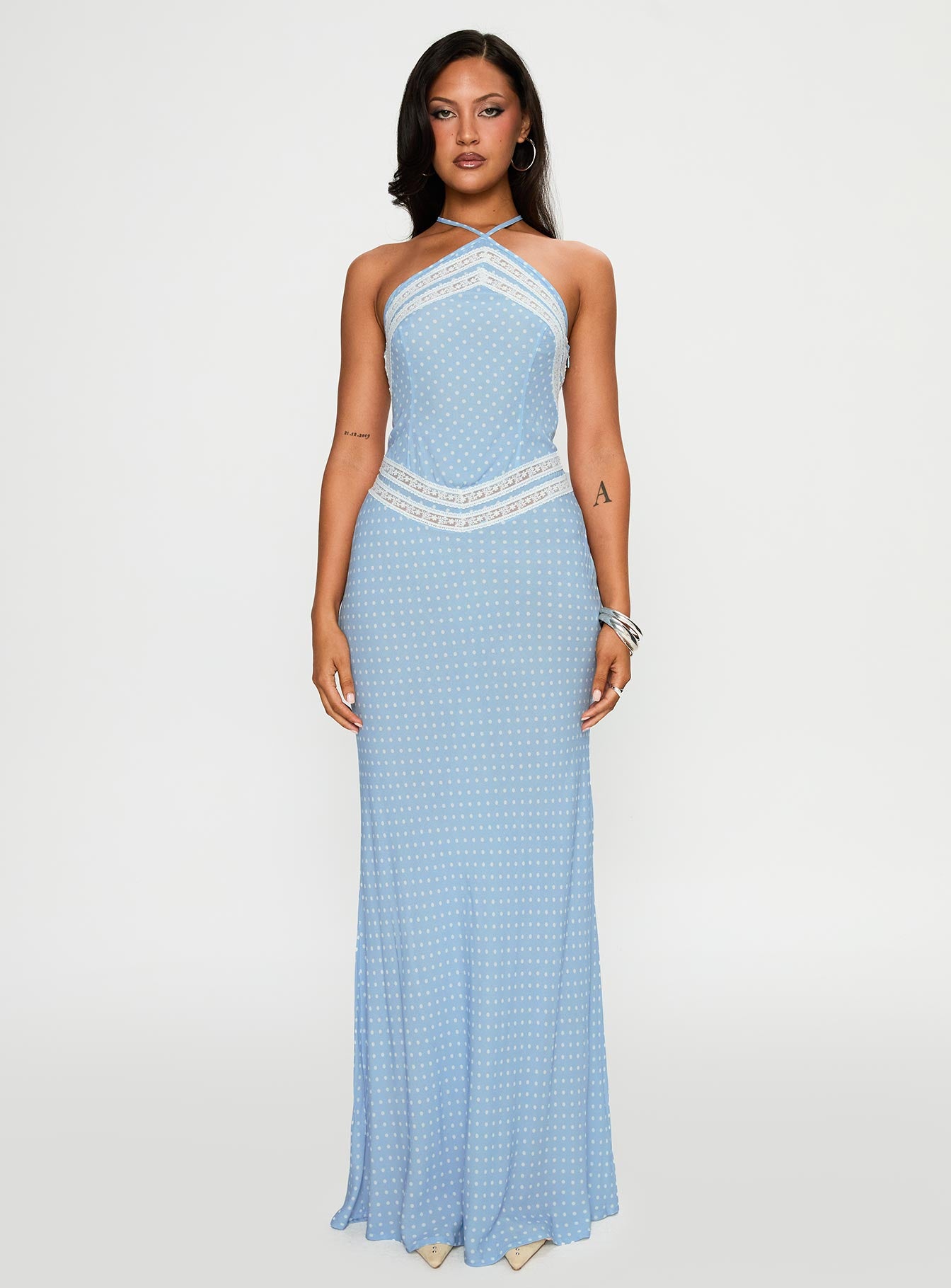 front view of model wearing Princess Polly Wild Joy Halter Maxi Dress Blue Polka Asymmetric Neckline 