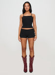 front view of model wearing Princess Polly Baseline Rib Top Black Sleeveless Square Neck 