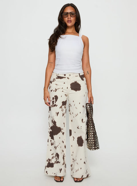 front view of model wearing Princess Polly Big Dreamer Low Rise Straight Leg Jeans Cow Print Low Rise Jeans 