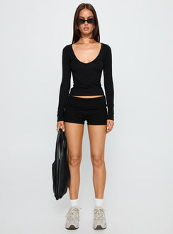 side view of model wearing Princess Polly Count Me In Long Sleeve Top Black Full Sleeves V-Neck 