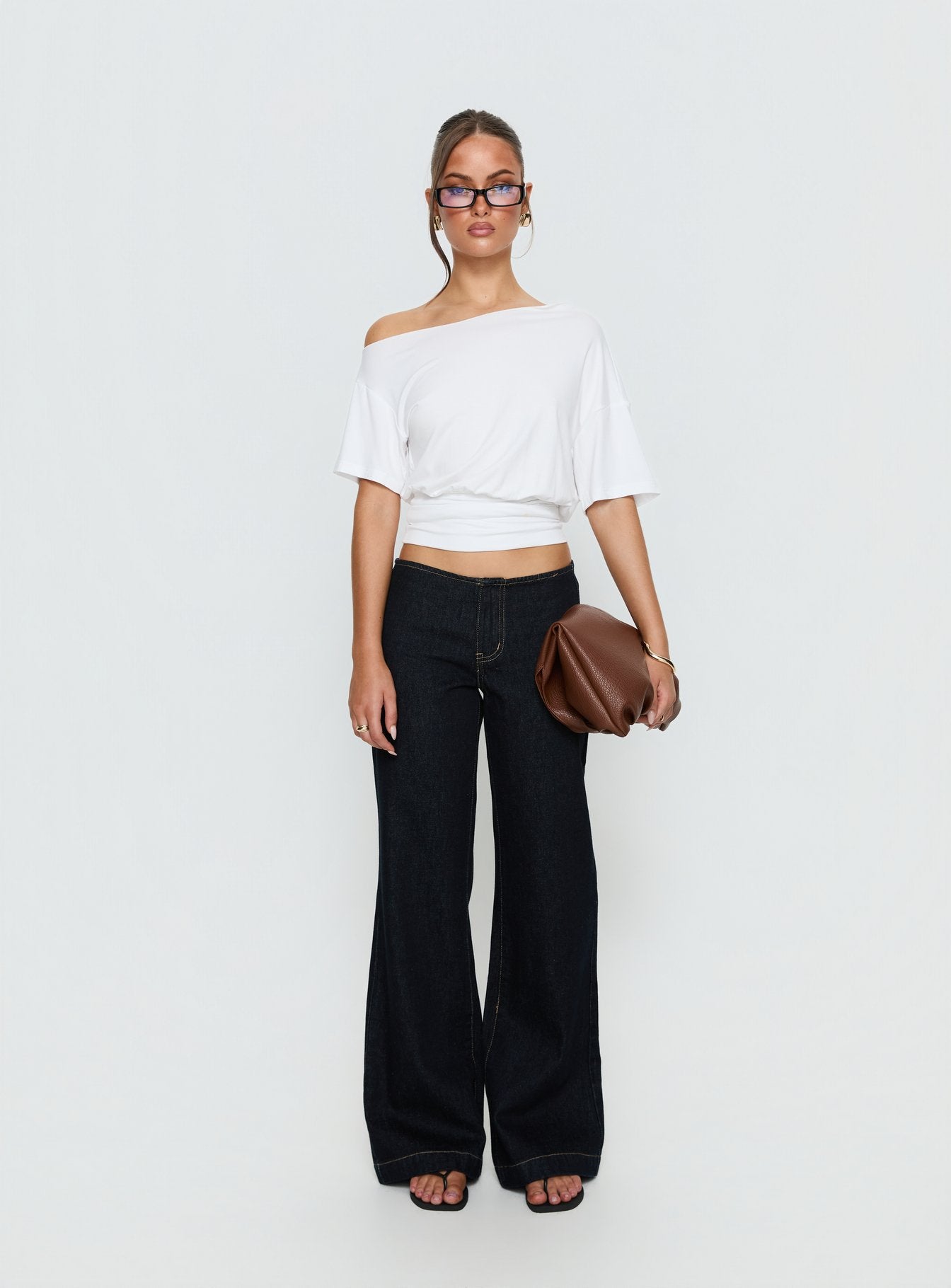 front view of model wearing Princess Polly Buenos No Waist Low Rise Straight Leg Jeans Raw Denim Mid Rise Jeans 