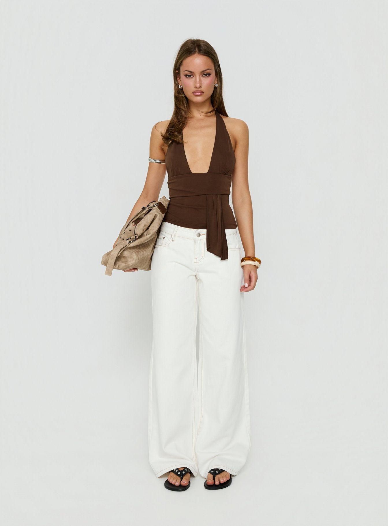Showcasing Tidal Wave Low Rise Straight Leg Jeans Cream in womens-jeans front view of model wearing Princess Polly