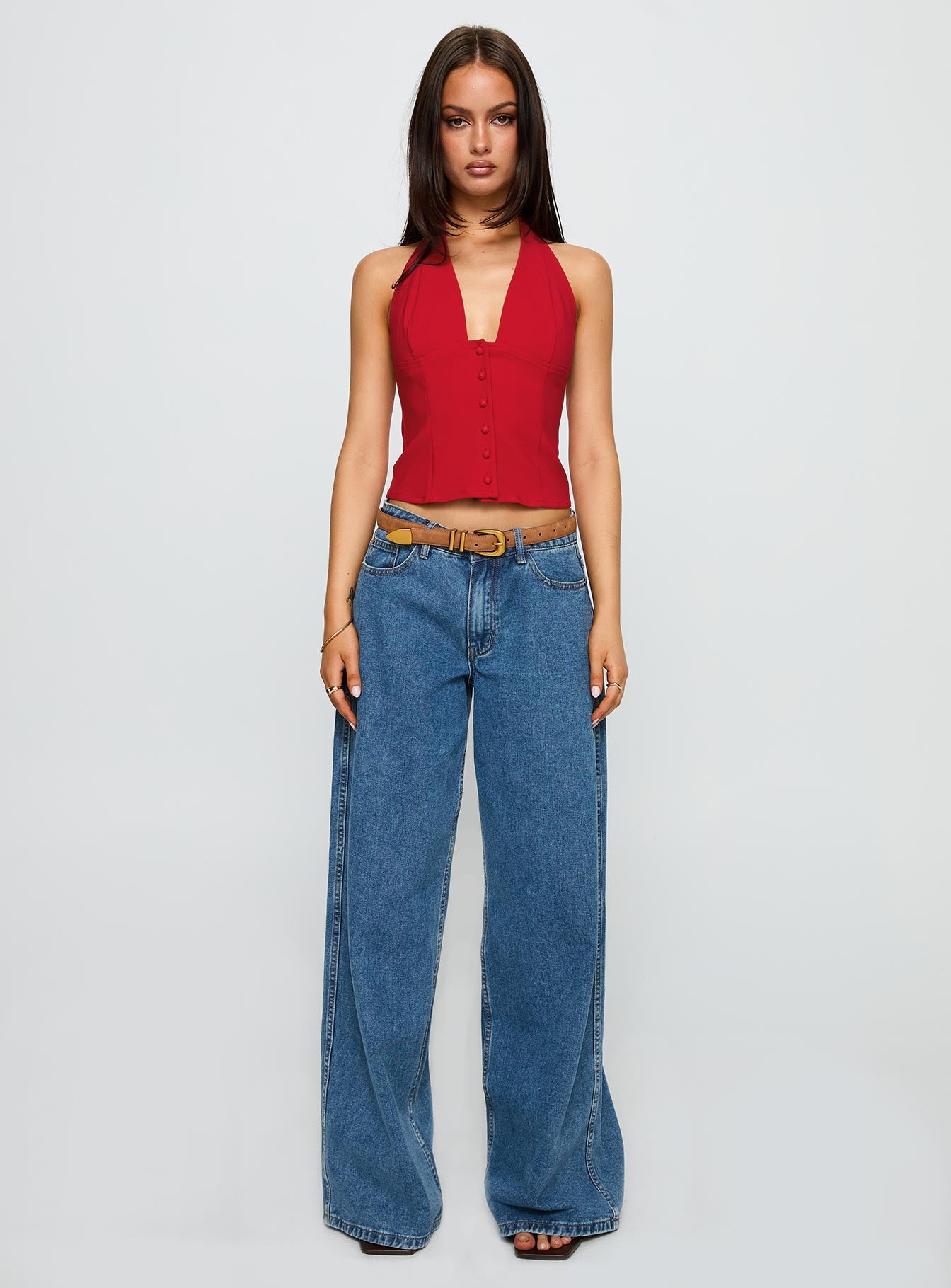 back view of model wearing Princess Polly Serefina Halter Top Red Sleeveless Plunger 