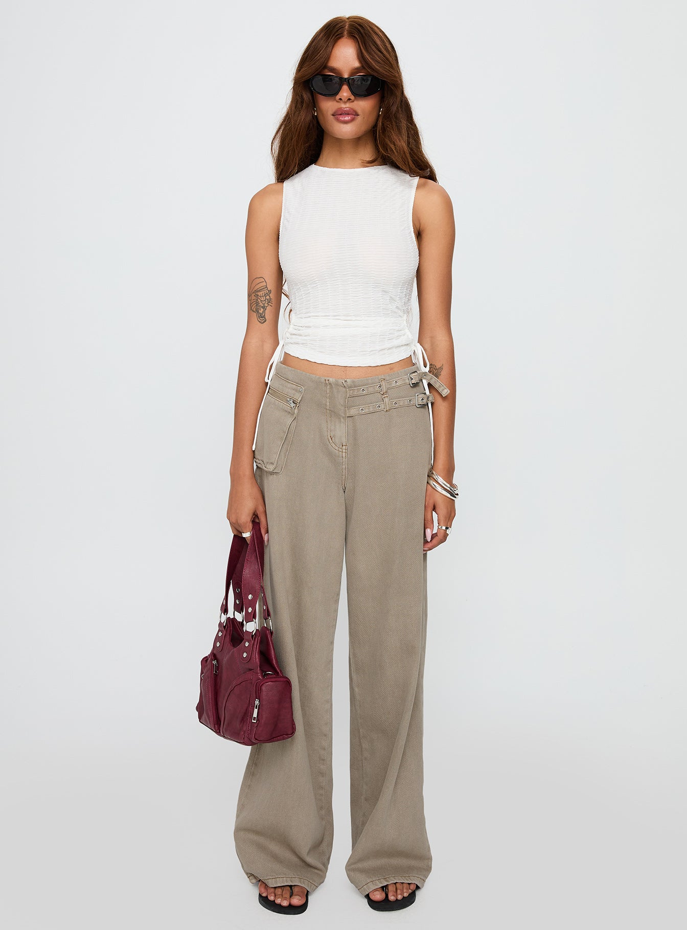 front view of model wearing Princess Polly Kaelis Tie Side Top White Sleeveless Crew Neck 