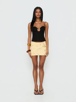   front view of model wearing Princess Polly Calyra Embroidered Mini Skirt Butter Yellow Mini Skirts 