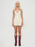 Romper V neckline, adjustable straps, open back with cross-over detail, tie fastening Non-stretch material, fully lined 