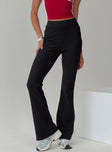 side view of model wearing Princess Polly Vasquez Flared Pants Black High Waisted Pants 