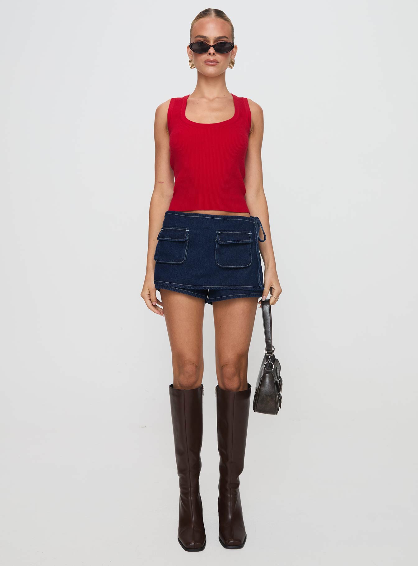 front view of model wearing Princess Polly Issues Top Red Sleeveless Scoop Neck 