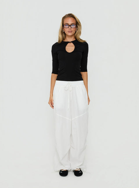 Discover the Mankind Baggy Cargo Pants White in womens-regular-pants with mid-rise, front view of model wearing Princess Polly