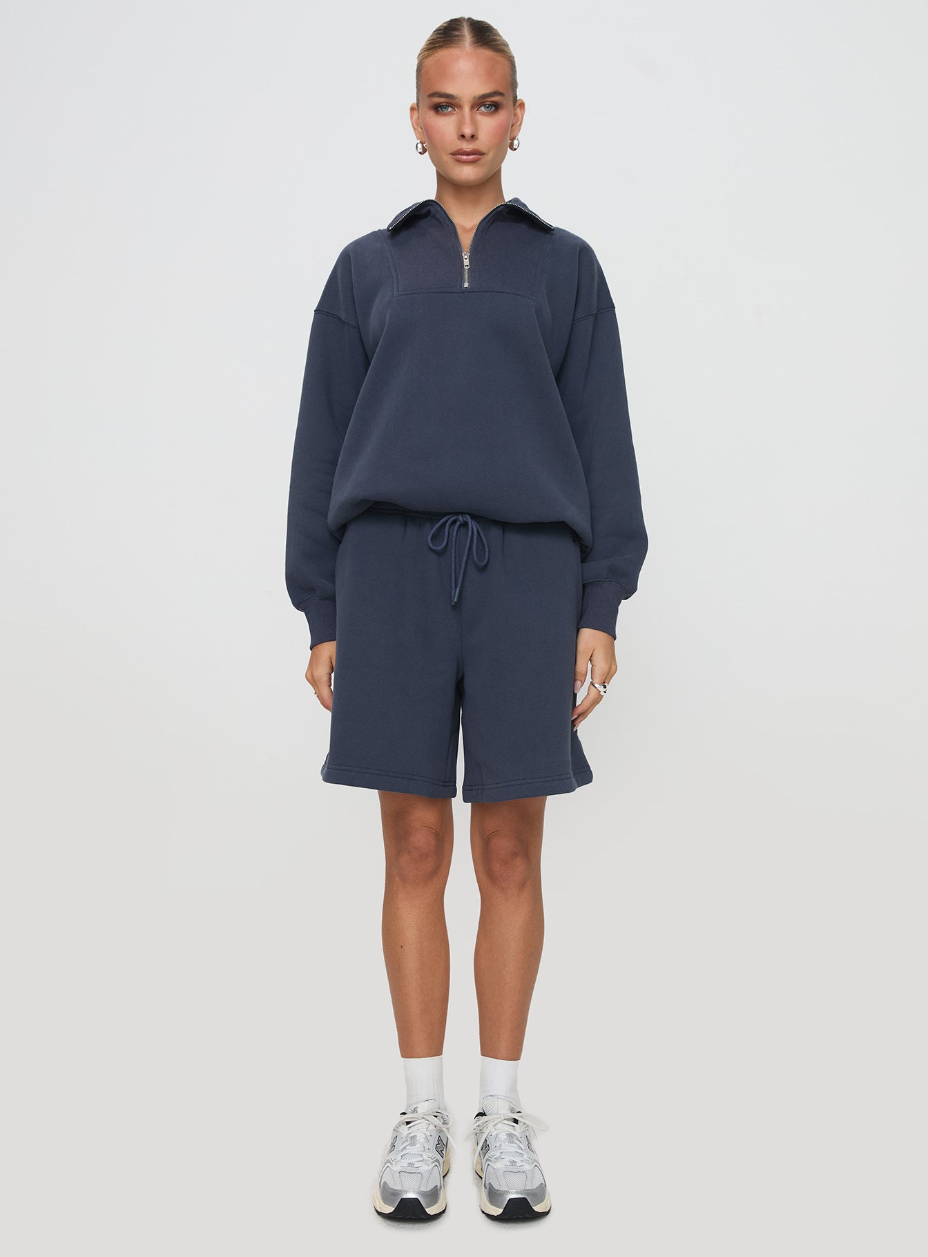 front view of model wearing Princess Polly Dream Fleece Longline Shorts Navy High Waisted Shorts 