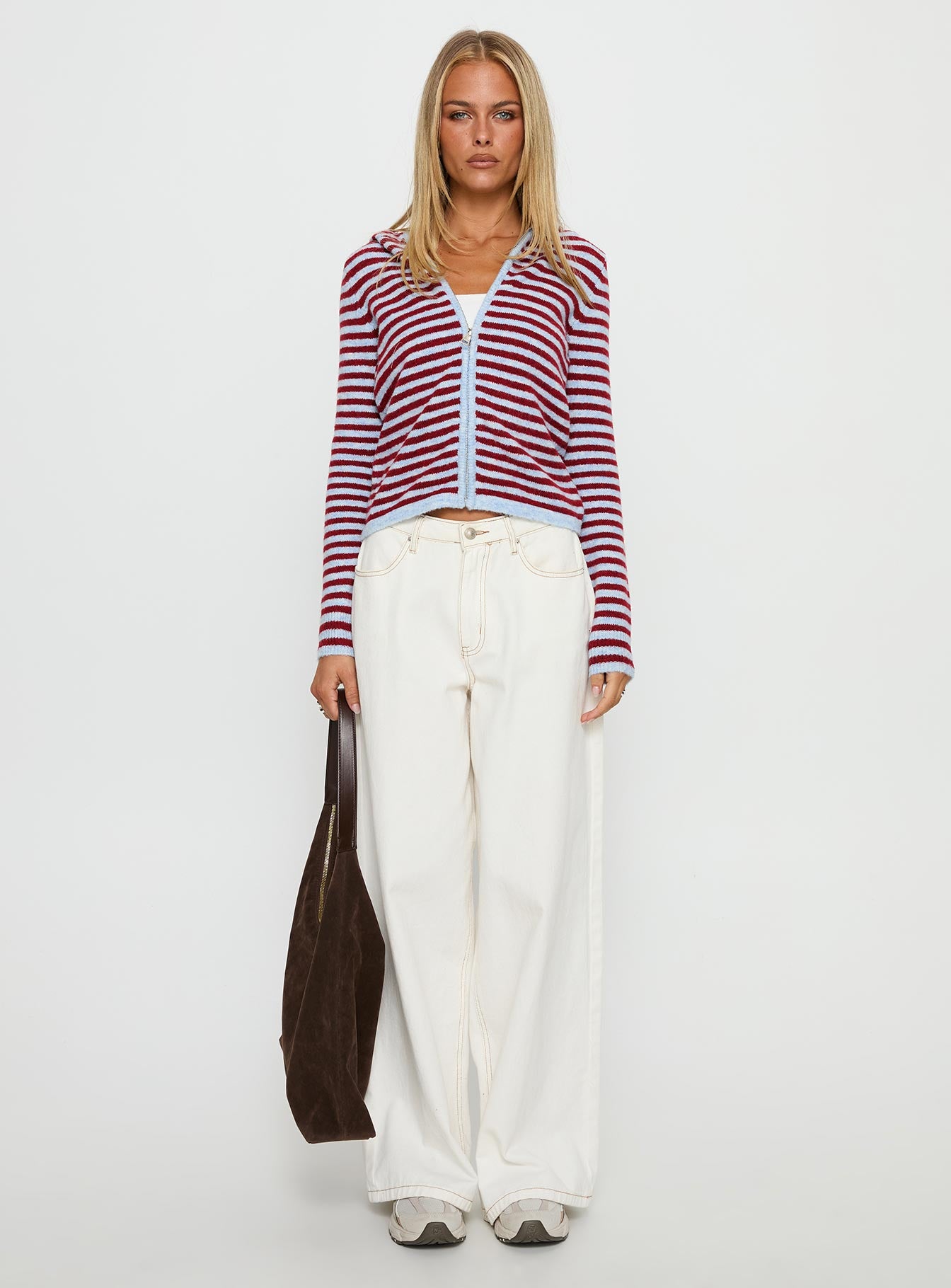 side view of model wearing Princess Polly Superstars Zip Through Hoodie Blue / Red Stripe cropped 