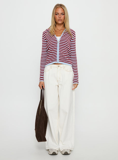 side view of model wearing Princess Polly Superstars Zip Through Hoodie Blue / Red Stripe cropped 