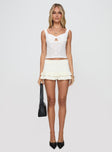 Front view of model wearing  front Princess Polly Sleeveless V-Neck  Boucher Top White