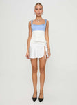 side view of model wearing Princess Polly Chantell Top Blue / White Sleeveless Sweetheart 