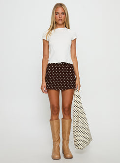   front view of model wearing Princess Polly Tejano Mini Skirt Brown Polka Dot Mini Skirts 