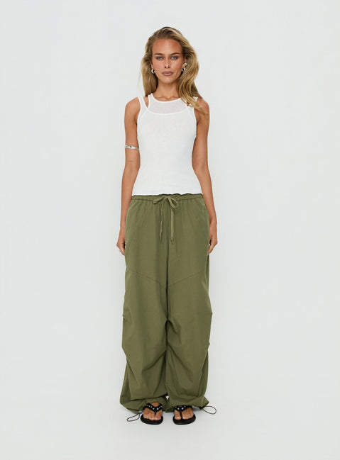 Discover the Mankind Baggy Cargo Pants Olive in womens-regular-pants with mid-rise waist front view of model wearing Princess Polly