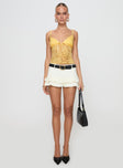 Front view of model wearing  front Princess Polly Sleeveless Plunger  Manski Lace Top Yellow