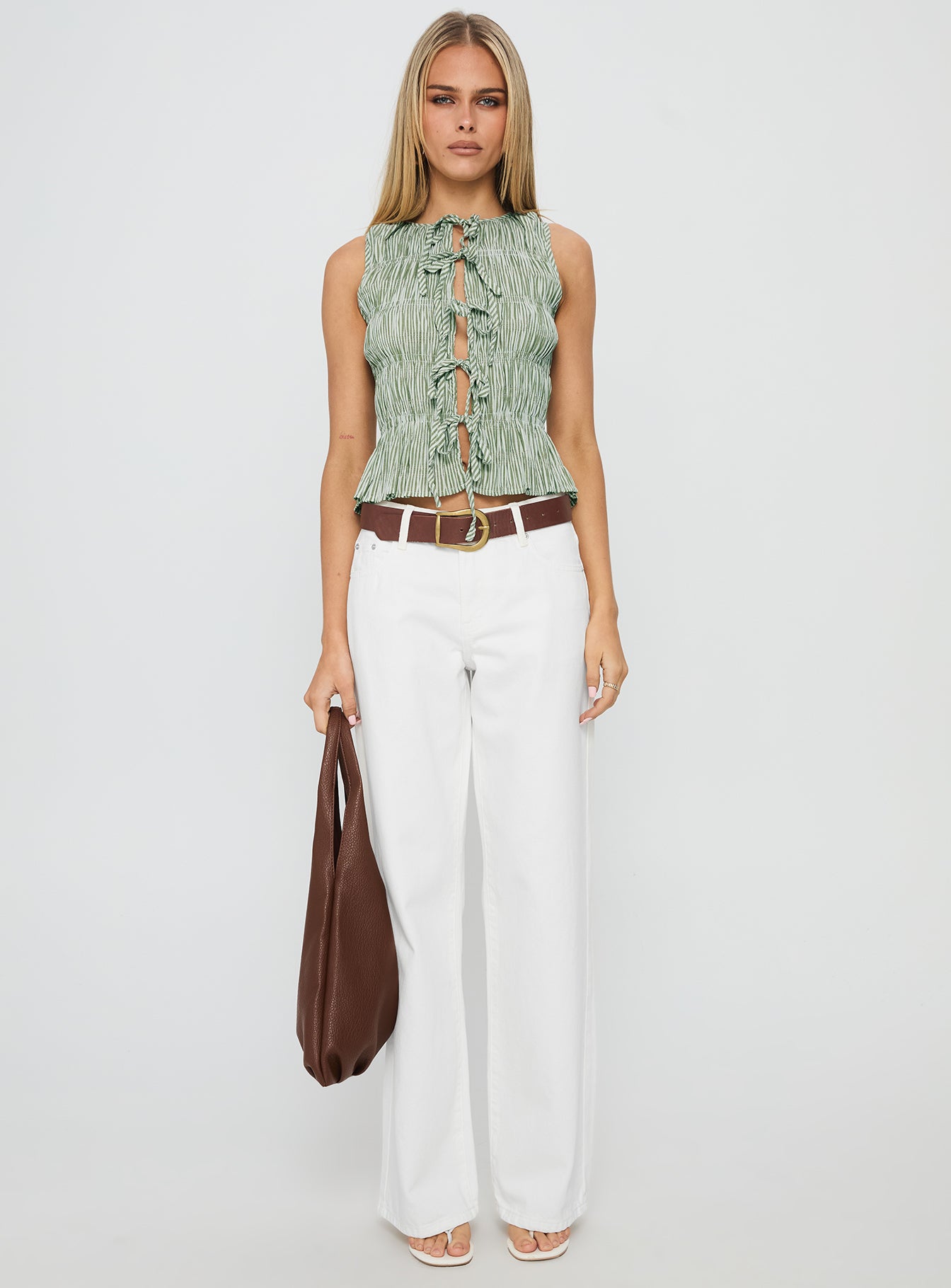 front view of model wearing Princess Polly Serenitia Mid Rise Straight Leg Relaxed Jeans White Wash High Waisted 