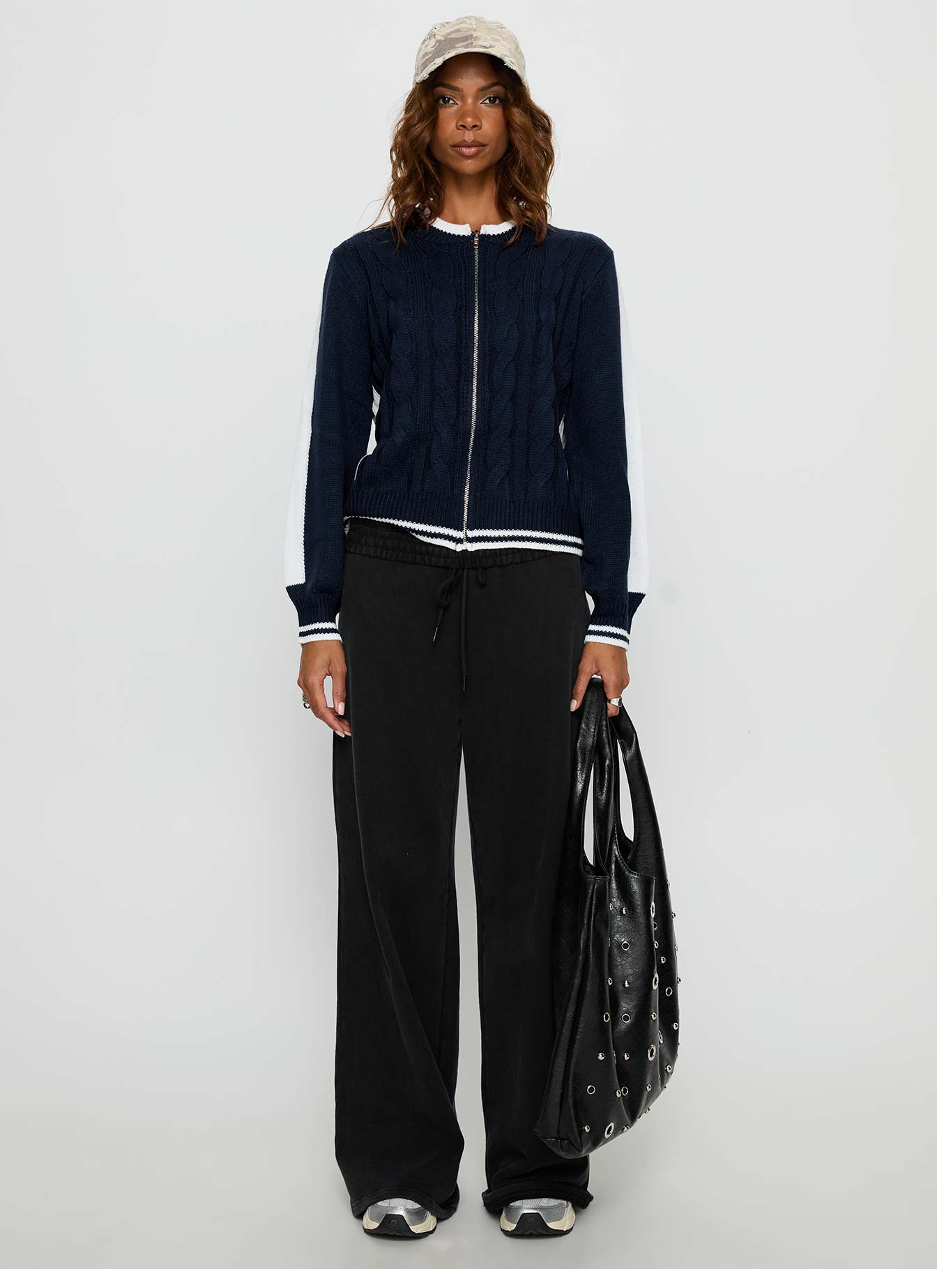 front view of model wearing Princess Polly Tevyn Cable Knit Zip Through Knit Sweater Blue / Cream Cropped Jumpers 