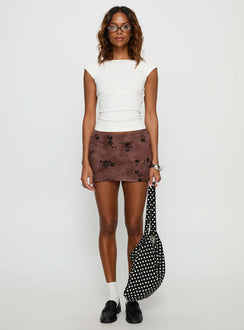   front view of model wearing Princess Polly Piazia mini skirt Brown Floral Mini Skirts 