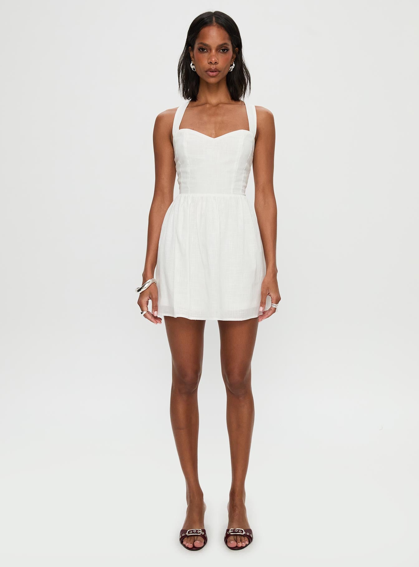 front view of model wearing Princess Polly Zolena Halter Mini Dress White Sweetheart Neckline 