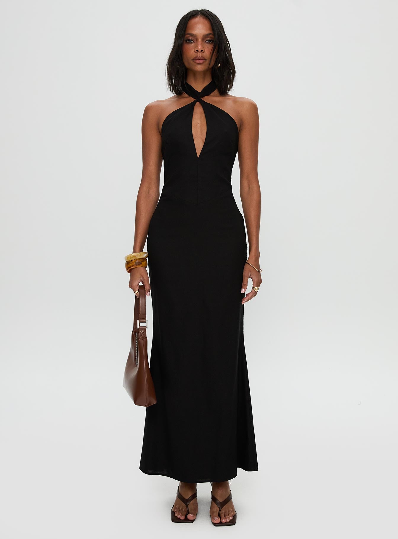 front view of model wearing Princess Polly Rapture Halter Maxi Dress Black Plunger 