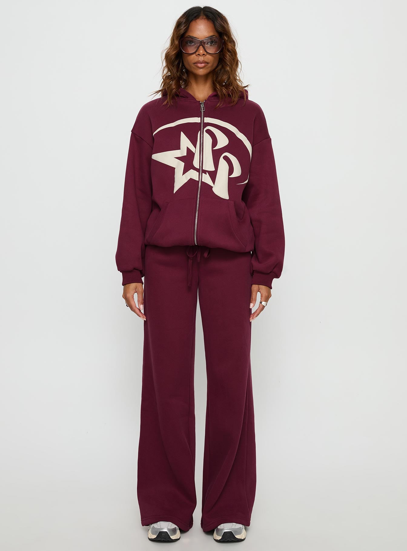 front view of model wearing Princess Polly Princess Polly Stargirl Wide Leg Sweat Pants Burgundy High Rise Pants 