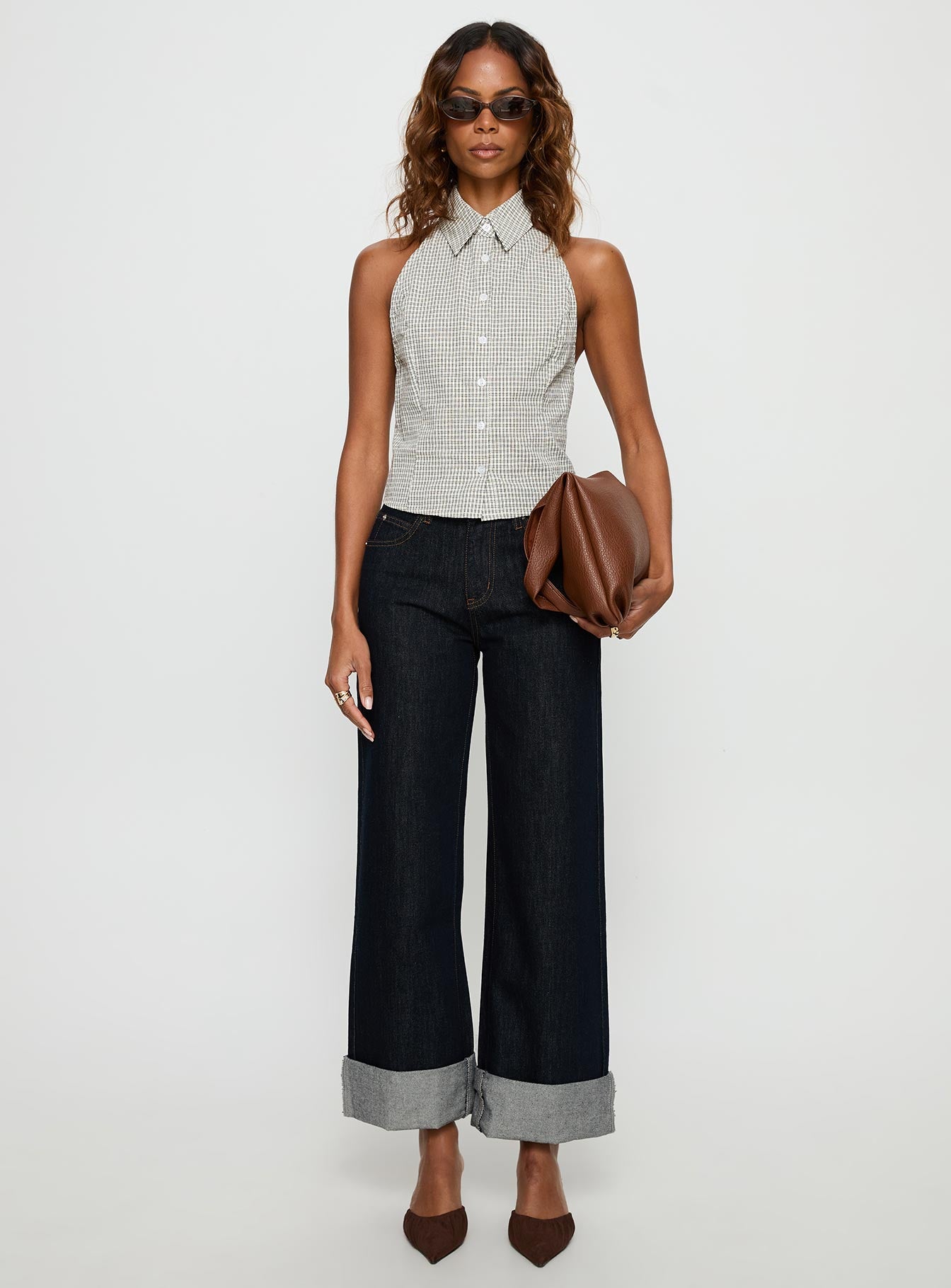 front view of model wearing Princess Polly Squire Mid Rise Straight Leg Folded Hem Jeans Indigo Wash Mid Rise Jeans 