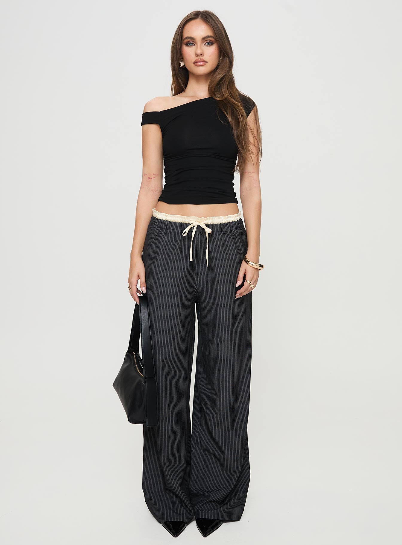 front view of model wearing Princess Polly Seraphic Pants Charcoal Stripe High Waisted Pants 