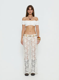 side view of model wearing Princess Polly Rosadonna Lace Flare Pants Cream Mid Rise Pants 