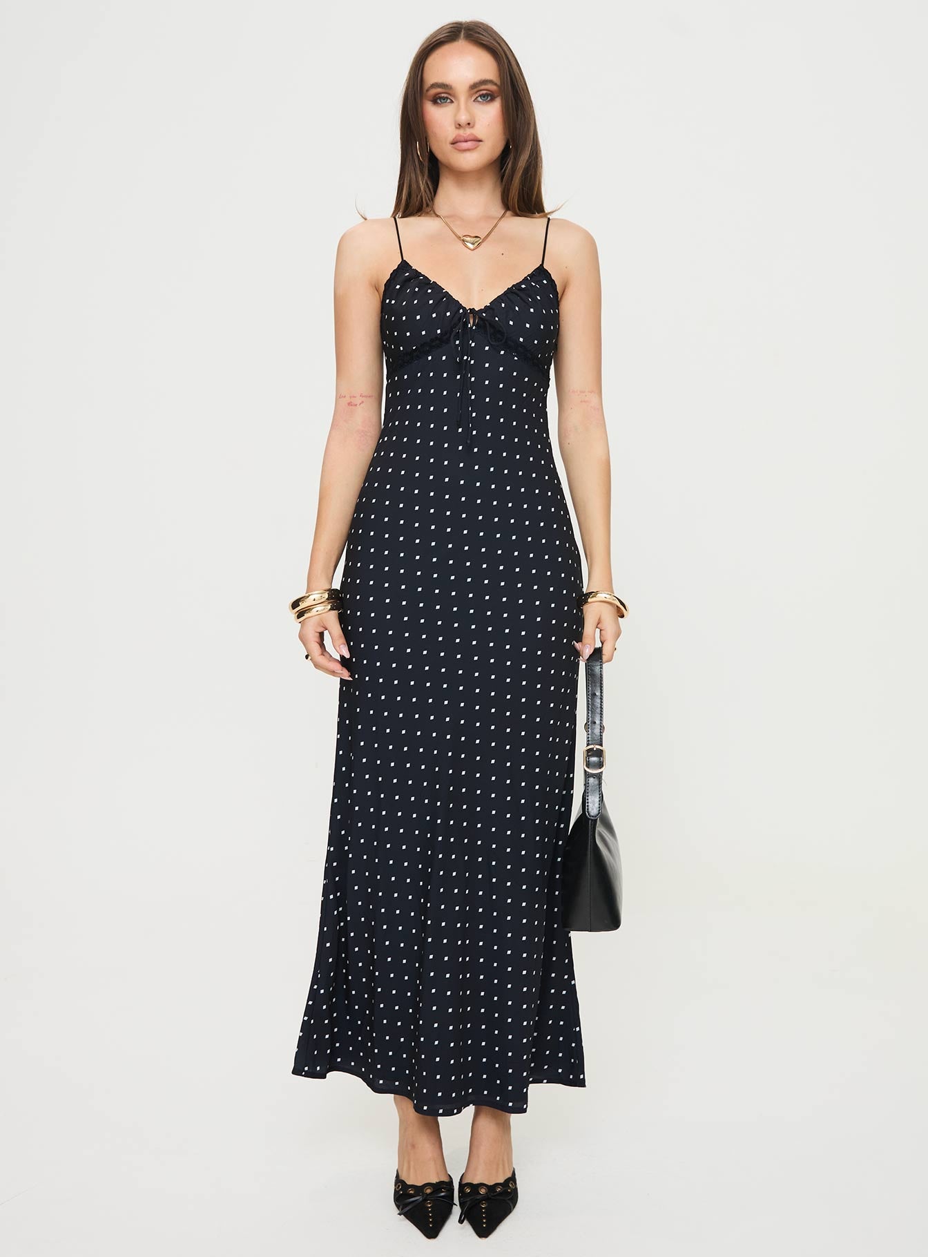 front view of model wearing Princess Polly Emily Maxi Dress Black Polka Dot V-Neck 
