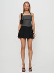   side view of model wearing Princess Polly Yeva Pleat Mini Skirt Black Mini Skirts 