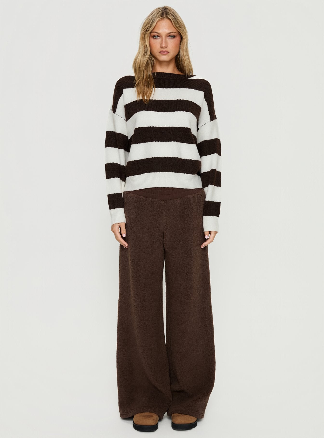 side view of model wearing Princess Polly Corlie Crew Neck Knit Sweater Brown Stripe Cropped Jumpers 