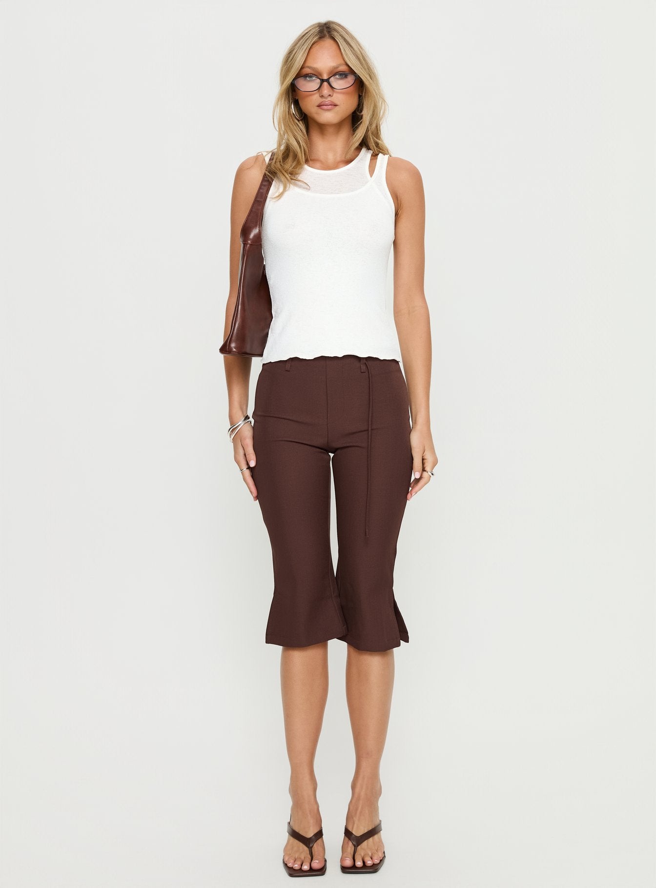 side view of model wearing Princess Polly Giorgie Belted Capri Pant Chocolate Brown High Rise Pants 