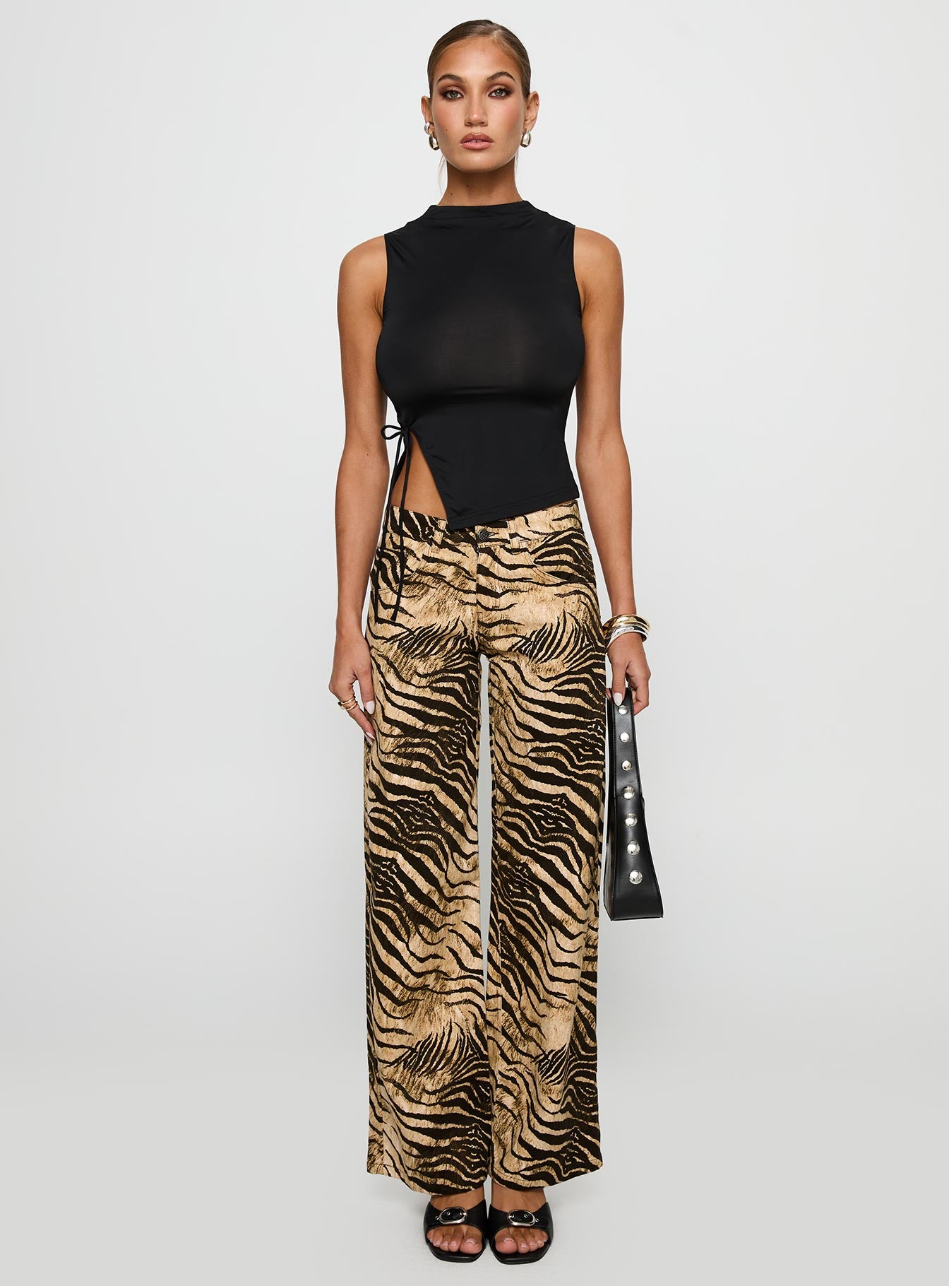 front view of model wearing Princess Polly Low Rise Roomy Pants Multi Low Rise Pants 