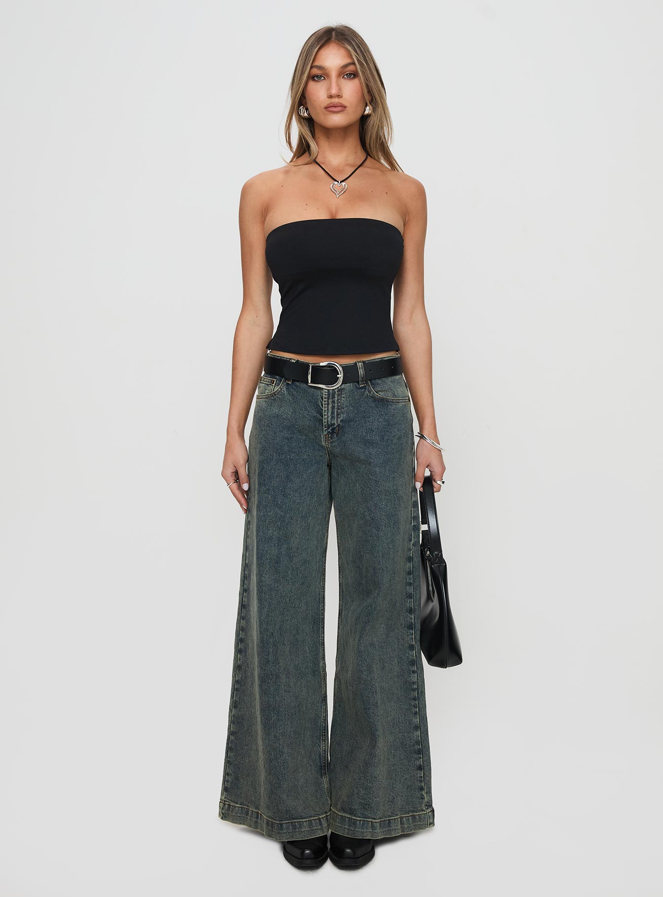 side view of model wearing Princess Polly Aurorah Strapless Top Black Sleeveless straight 