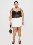 front view of model wearing Princess Polly Kerr Lace Top Black Curve Sleeveless Sweetheart 