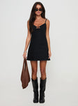 front view of model wearing Princess Polly Arwen Denim Mini Dress Black V-Neck 