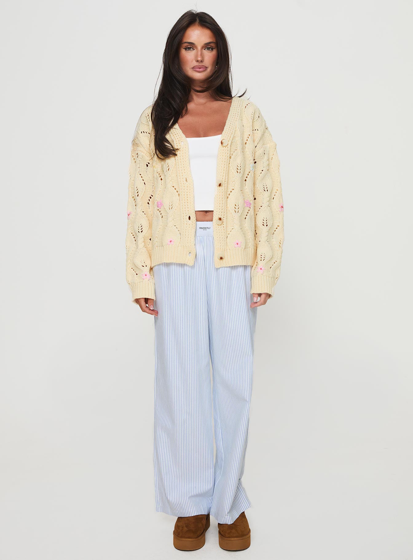 front view of model wearing Princess Polly Daffodil Cardigan Cream Cropped 