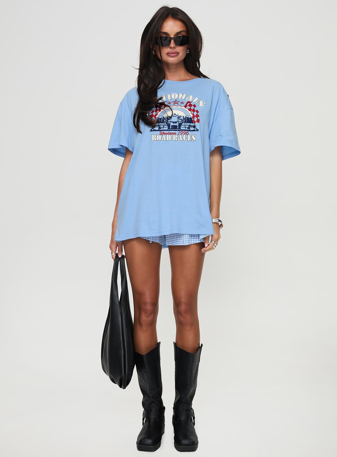 front view of model wearing Princess Polly Races 1996 Oversized Tee Blue Half Sleeves Crew Neck 