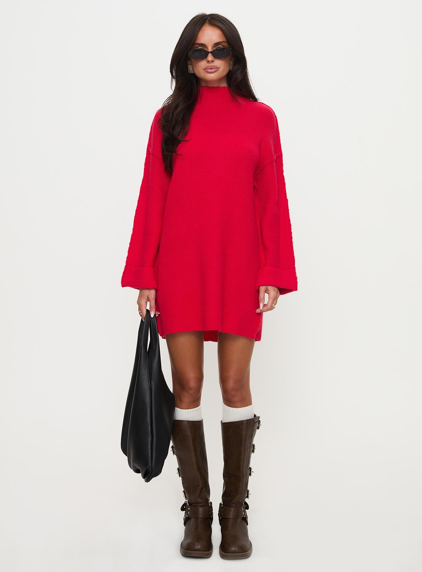side view of model wearing Princess Polly Weslie Long Sleeve Knit Mini Dress Red High Neck 