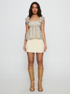   front view of model wearing Princess Polly Another Day Knit Pleat Mini Skirt Butter Yellow Mini Skirts 