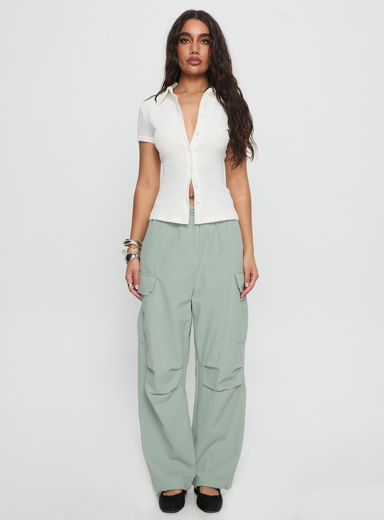 front view of model wearing Princess Polly Elanthea Cargo Pants Green High Waisted Pants 